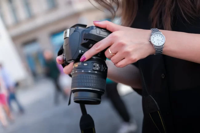 woman holding black dslr camera, Photography